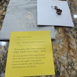 Kendra Scott Gold and Black Rose Charm: Women Empowerment